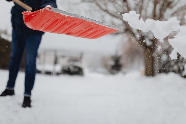 Free A Person Shoveling Snow Stock Photo